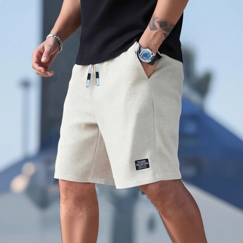 Shorts pour hommes, pantalons décontractés pour hommes, shorts de plage pour hommes, shorts de sport pour hommes, nouveau tissu texturé à la mode, pantalons respirants, adaptés aux vêtements décontractés quotidiens et