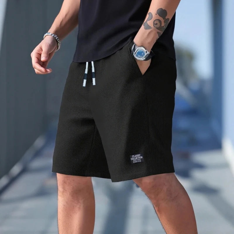 Shorts pour hommes, pantalons décontractés pour hommes, shorts de plage pour hommes, shorts de sport pour hommes, nouveau tissu texturé à la mode, pantalons respirants, adaptés aux vêtements décontractés quotidiens et
