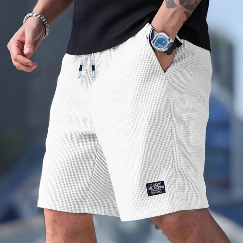 Shorts pour hommes, pantalons décontractés pour hommes, shorts de plage pour hommes, shorts de sport pour hommes, nouveau tissu texturé à la mode, pantalons respirants, adaptés aux vêtements décontractés quotidiens et